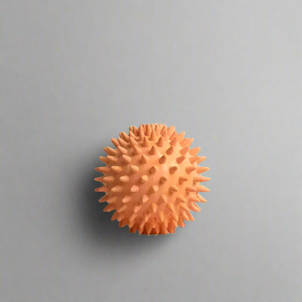 FitSupplyZone spiky massage ball in beige for deep tissue muscle relief and trigger point therapy
